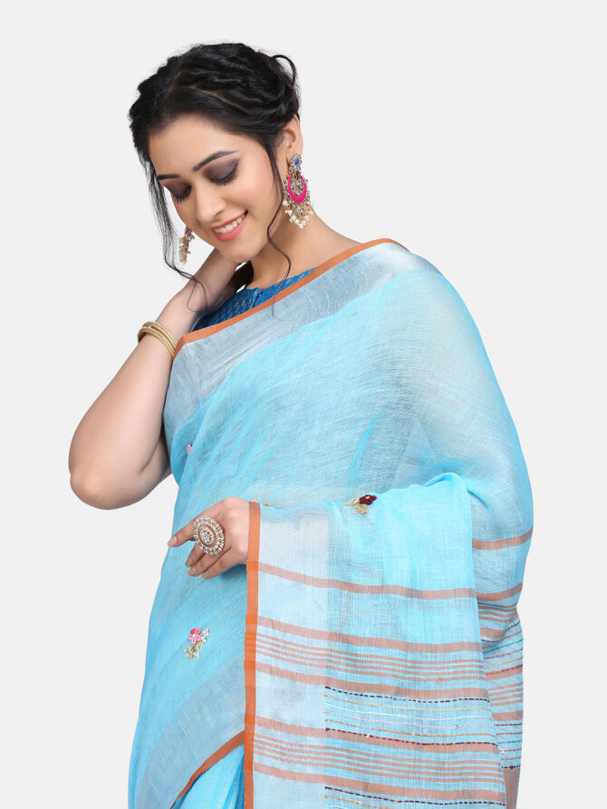 Aqua Blue Hand Embroidered Linen Saree
