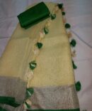 Cream White Silver Zari Green Border and Tassels Solid Color Saree
